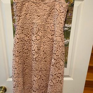 Two dresses..the taupe dress worn once  the second never worn tag is still on it